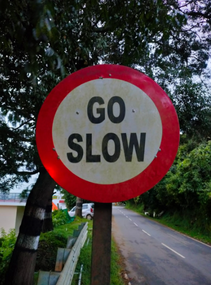 Go Slow Sign Board